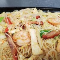 Pad Thai Spicy Noodle · Thin Thai rice noodle with egg, beans sprouts, green onion, chicken and shrimp wok stir-frie...