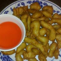Sweet & Sour Chicken · Crispy breaded white meat chicken with bell pepper onion carrots and diced pineapple glazed ...