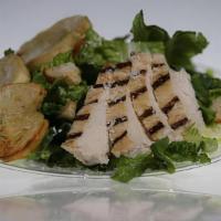 Grilled Chicken Caesar Salad · Chopped romaine, shaved parmesan, grilled chicken, sourdough croutons and caesar dressing. S...