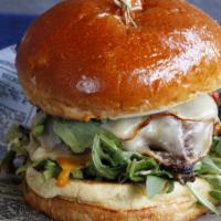 Truffle Mushroom Burger* · Wild mushrooms, demi-glace, caramelized onions, truffle cheese, arugula, chive aioli, brioch...