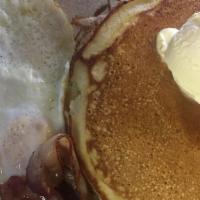 Pancake Breakfast · Includes 2 Eggs Any Style, your choice Of Bacon,Ham Or Sausage And Three Pancakes