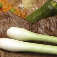 Carne Asada Plate · Traditional Mexican Steak Dinner Plate With Grilled Onions And A Deep Fried Jalapeño Pepper