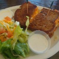 Albacore Tuna Melt · Our albacore tuna mixture with melted cheddar cheese on grilled sour dough bread. choice of ...
