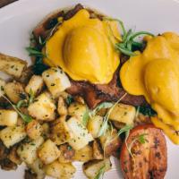 Peppa Benedict · Poached eggs, toasted English muffin, sautéed spinach, double-smoked bacon, and Sriracha hol...