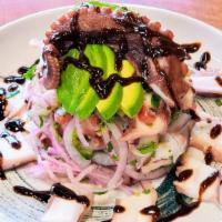 Octopus Ceviche · Octopus freshly marinated in citrus with tomatoes, red onions, cilantro, cucumbers, and avoc...