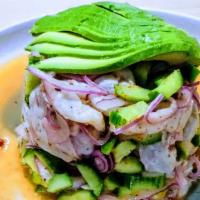 Aguachiles · Raw shrimp seasoned with chiltepin 
peppers, fresh lime juice, red onions, cucumbers & avoca...