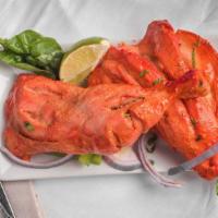 Chicken Tandoori · Grilled chicken marinated in yogurt and spices