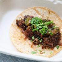 Beef 'Street' Taco · Braised Brisket with Salsa Verde, Onions, and Cilantro, in a Corn Tortilla. 1/4 pound taco.