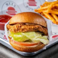 Fried Chicken Sandwich · Our Fried Chicken Sandwich is served with lettuce, tomato, and our signature Chicken Sauce o...
