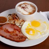 Hole In One Breakfast  · 2 Eggs With choice of ham, chorizo, turkey, sausage, or bacon with country potatoes and pot ...