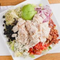 Cobb Harvest Salad · Choice of chicken or turkey lettuce, tomato, red onion, avocado, bacon, egg, Blue cheese, sp...