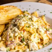 Chicken Farfalle · Bleu cheese, tender grilled chicken, bacon, mushrooms, garlic, red and green onions, basil, ...