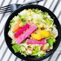 House Salad · Lettuce tomato, cucumber with oil, lemon, salt and pepper.