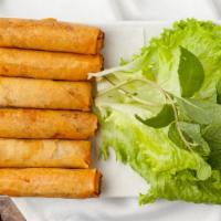 Crispy Rolls (6) · A savory mixture of carrot, taro, rice vermicelli, & shredded mushroom paired with Nuoc Mam ...