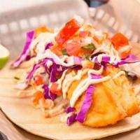 Baja Fish Tacos  · Crunchy battered fish, magic sauce, cabbage, pico de gallo and Abby’s sauce.