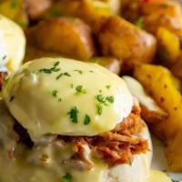 Egg Benedict · English muffin, poached egg, ham, spinach, mushroom and hollandaise sauce.