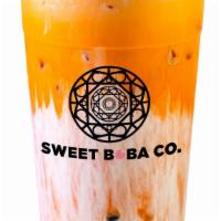 Thai Milk Tea · Our Thai tea topped with our house cream.