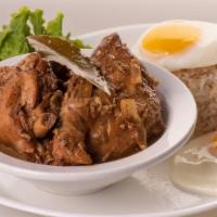 Chicken Adobo Combo · Chicken braised in vinegar, soy sauce, garlic, and black peppercorn. Served with steamed ric...