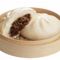 Pork Siopao · A steamed bun filled with sweet and savory pork Asado. Serving for one.