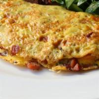Salmon Omelette · Jerk Salmon Omelette with Cheese, Tomatoes & Onions