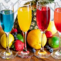 Mango Mimosa Kit · Mango Puree & Bottle of Champagne