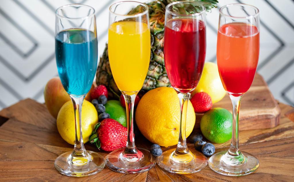 Mango Mimosa Kit · Mango Puree & Bottle of Champagne
