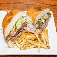 Cubana · Served with milanesa, ham, carnitas, beans, cheese, lettuce, tomatoes, onions, jalapeños and...