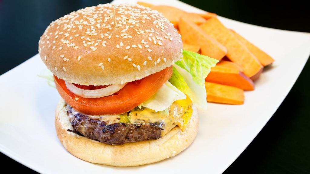 Classic Cheese Burger With Fries · 100% Angus beef, lettuce, cheddar cheese, tomatoes, onions and pickles.