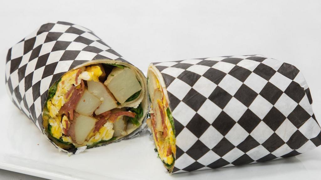 Breakfast Burrito · Served with eggs, potatoes, spinach, cheese and turkey bacon.