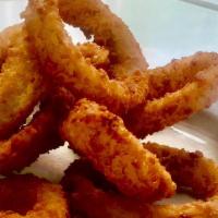Onion Rings · Thick-sliced, breaded, and cooked up crispy and golden brown.