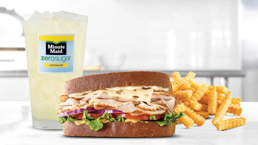 Roast Turkey & Swiss Meal · Sliced roast turkey with Swiss cheese, lettuce, tomato, red onion, spicy brown honey mustard and mayo on sliced honey wheat bread. Visit arbys.com for nutritional and allergen information.