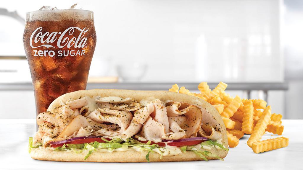 Turkey Gyro Meal · Thinly sliced roast turkey with Greek seasonings, cool creamy tzatziki sauce, lettuce, tomato, and red onion in a warm pita. Visit arbys. Com for nutritional and allergen information.