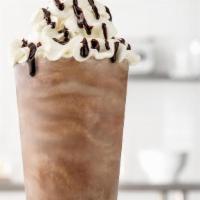 Ultimate Chocolate Shake · A rich & creamy chocolate shake made with Ghirardelli® chocolate, and topped with whipped li...