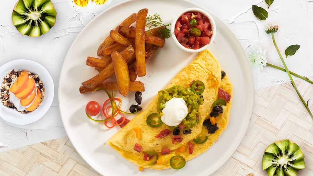 Mexican Omelette · Tomato, onion jalapeno, and Jack cheese.