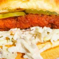 Nashville Style Crispy Fried Chicken Sandwich · crispy fried chik'n sandwich drenched in Nashville style hot sauce with slaw, pickles, and h...