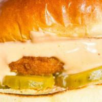 Crispy Fried Chik'N Sandwich · crispy fried chicken sandwich served with spicy mayo and pickles on a toasted Brioche bun