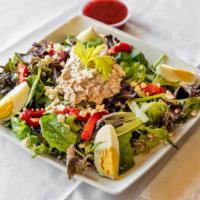 Tuna Salad · Mixed greens , tuna dressed with mayo & lime celery , hard boiled egg , feta cheese & red ro...