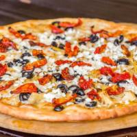 Greek Pizza · Feta cheese, artichokes, black olives, sundried tomatoes, garlic, olive oil sauce, mozzarell...