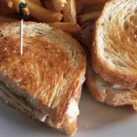 Turkey Melt · Roasted turkey breast, swiss, ortega chile on grilled sourdough.