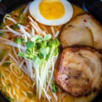 Spicy Tonkotsu · Ramen Noodles, Port chashu, halved egg, topped with green onion, served in a spicy Tonkotsu ...