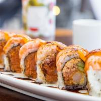 Samurai Roll · In: Shrimp tempura, Spicy tuna and cucumber
Top: Seared salmon, eel sauce and spicy mayo