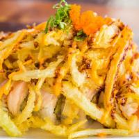 Albacore Special Roll · In: Spicy tuna, shrimp tempura & cucumber
Top: Albacore, tempura onion, ponzu sauce, spicy m...