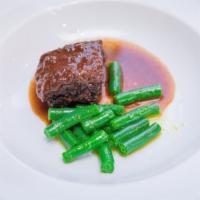 Il Brasato Del Gronchi · Braised short rib with vegetable of the day.