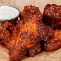Haus Bbq Wings · Classic Bone-In Wings in our haus bbq sauce; served with a choice of dipping sauce