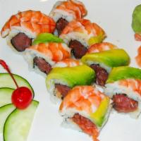 Tiger Roll · In: spicy tuna roll. Out:shrimp avocado on top. with sweet and mayo sauce.