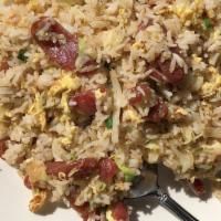 Chinese Pork Sausage Fried Rice · Chinese pork sausage. Contains eggs, peas, carrots and bean sprouts.