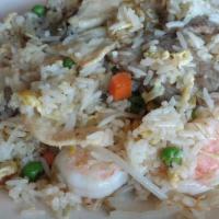 Deluxe Fried Rice · Served with chicken, pork, beef, shrimp, eggs, peas, carrots and bean sprouts.
Contains: egg.