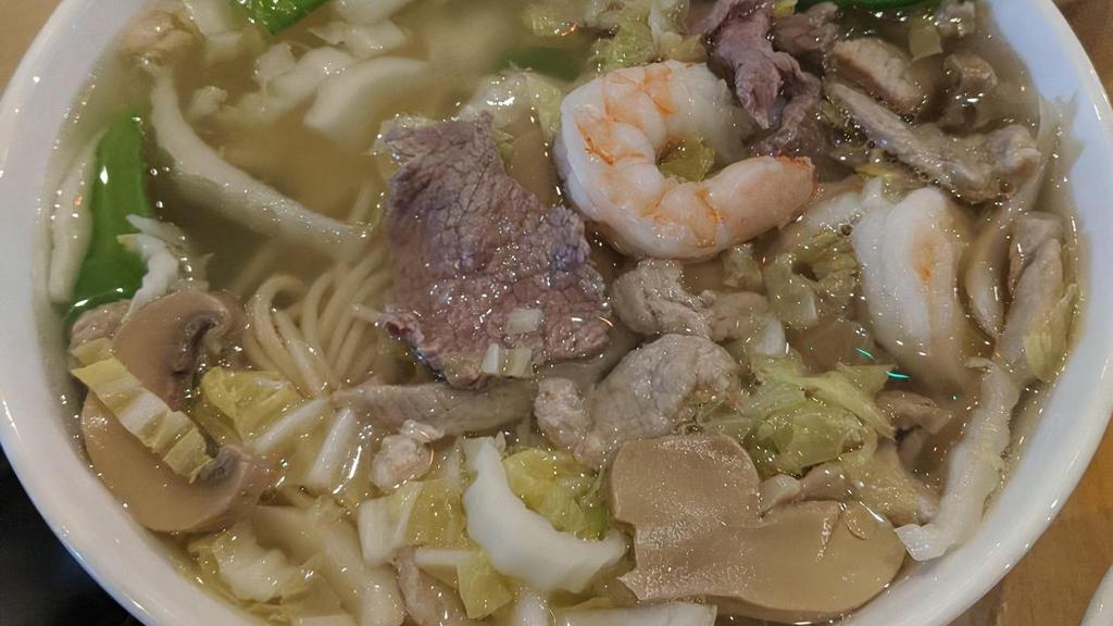 Deluxe Noodle Soup · Served with chicken, beef, pork and shrimp. Snow peas, cabbage, and mushrooms in a clear broth.
Contains: eggs and flour.