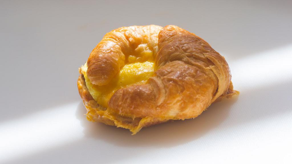 Two Eggs And Cheese On A Croissant · Delicious breakfast sandwich made with two eggs and cheese, served on a buttery Croissant.