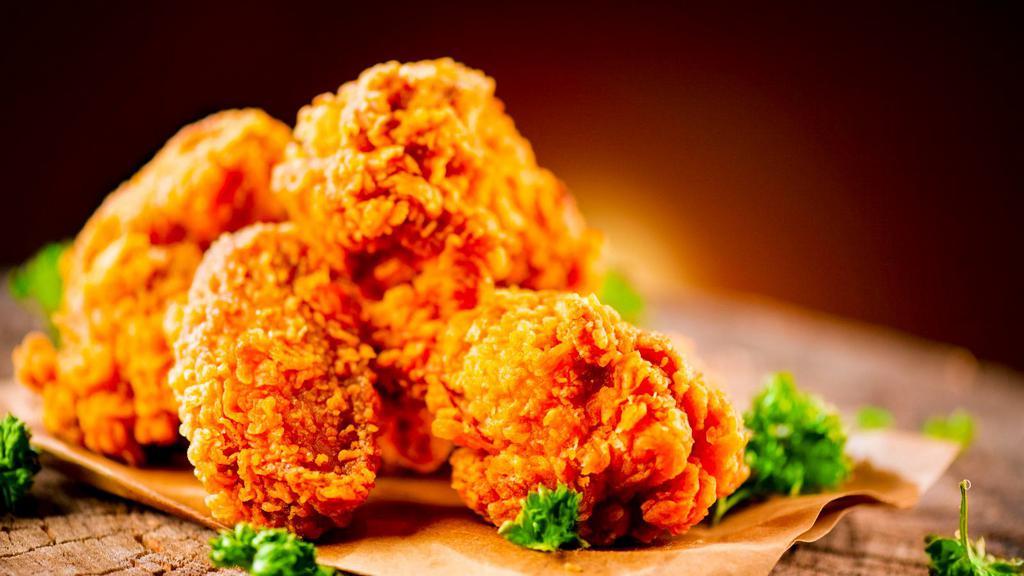 Plain Wings (6 Pieces) · Golden, fried, crispy on the outside, juicy on the inside wings. Served with celery and carrot sticks and your choice of dip.